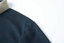 Polo masculina de manga comprida com gola virada para baixo
